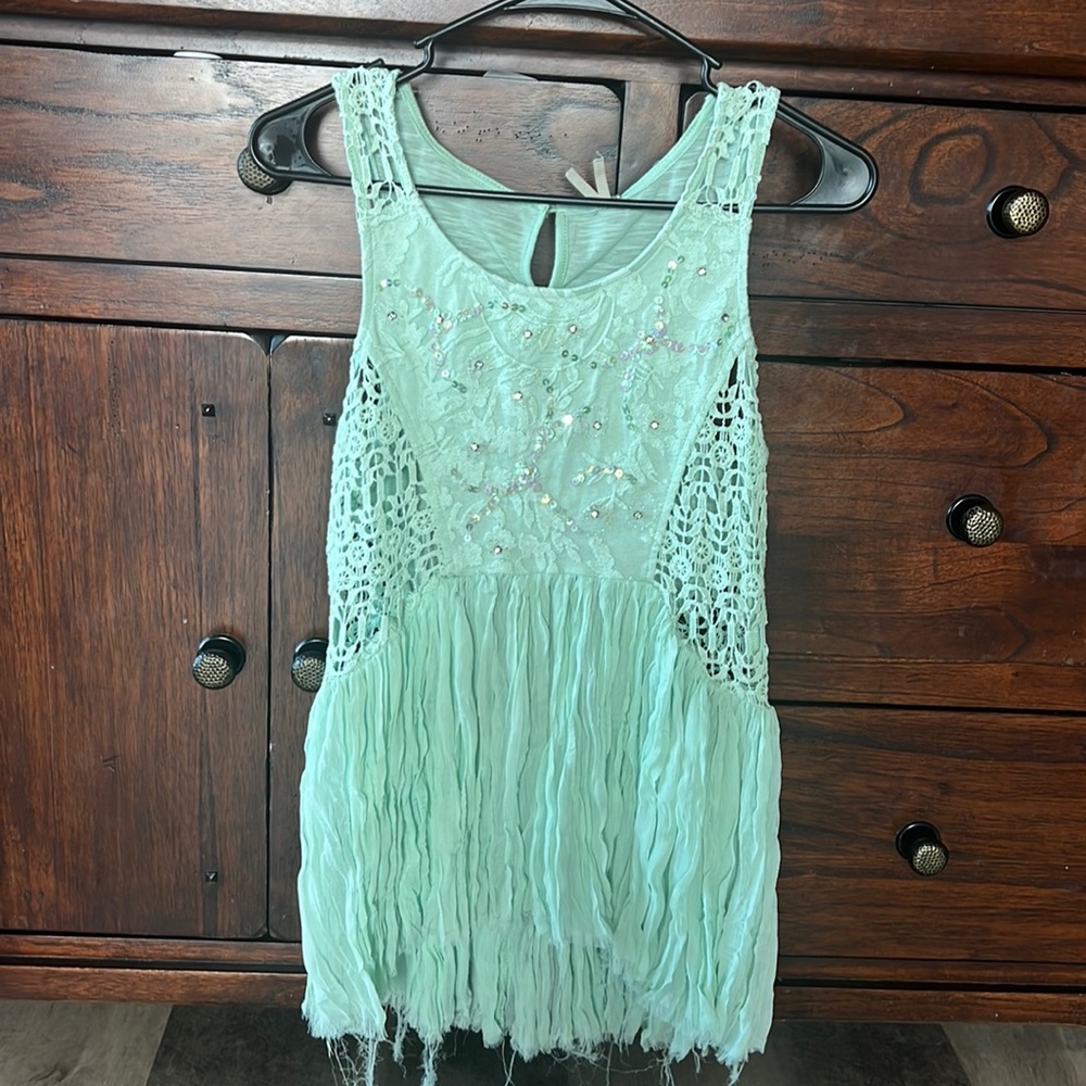 Dressy, flowy, ruffled see through sides shirt for women